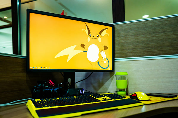 USB-C dock and laptop on a clean desk setup